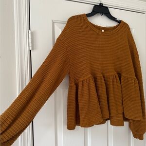 Rust Waffle Knit Peplum Sweater